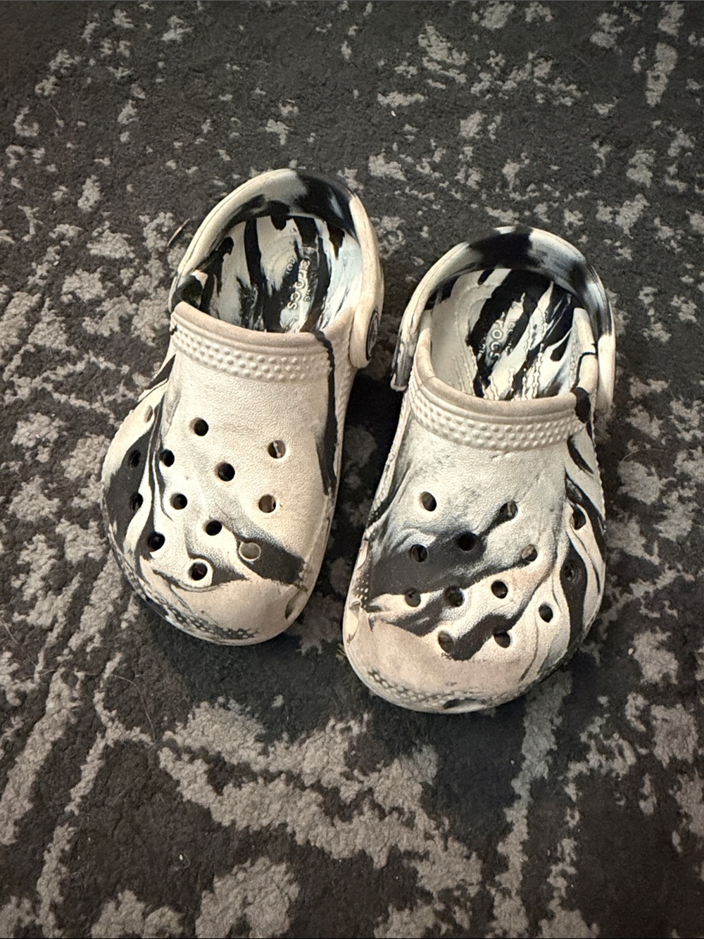 Crocs Marble-Print Slip-On Clogs in White and Black
